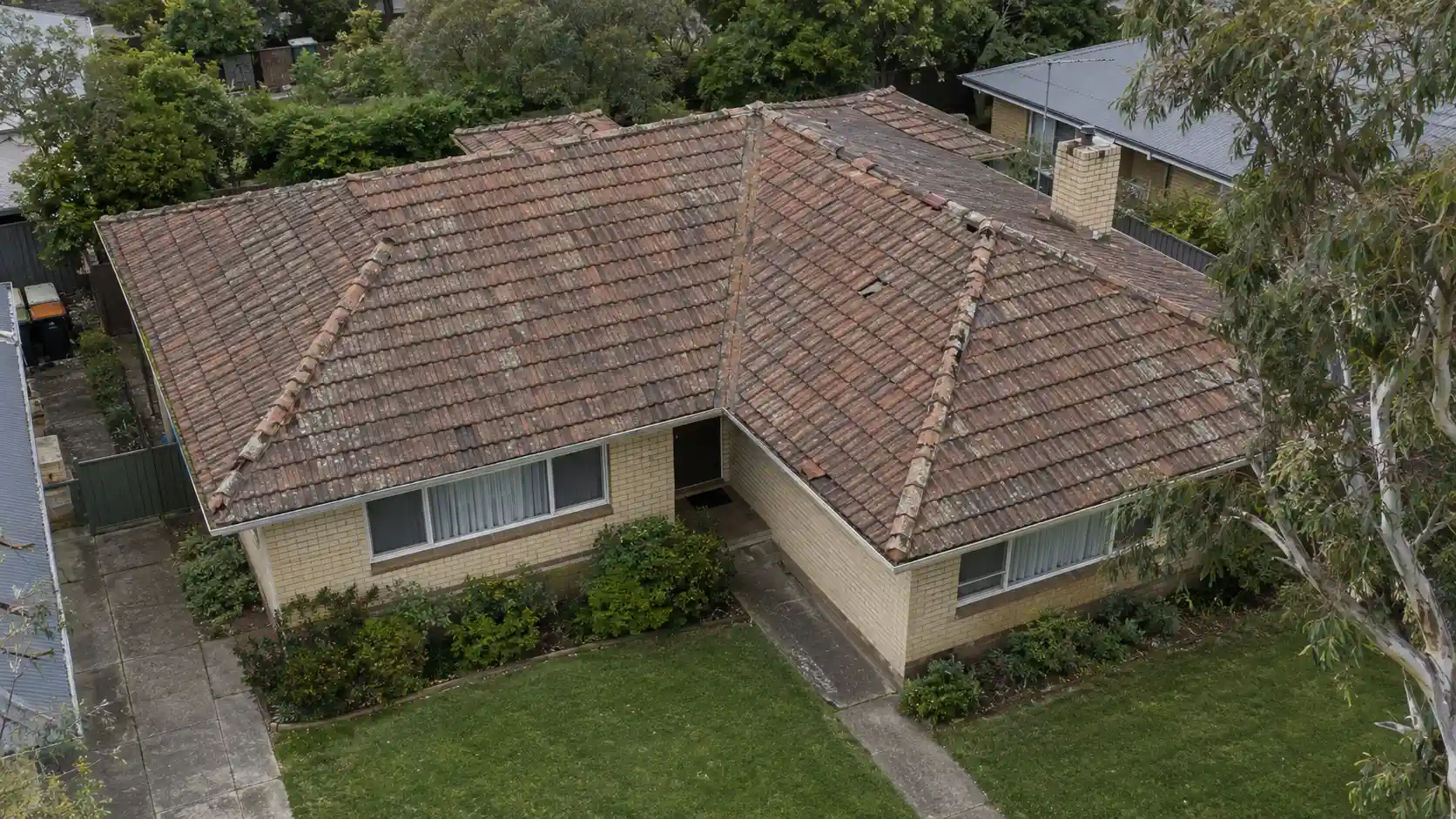 Cracked concrete tile roof
